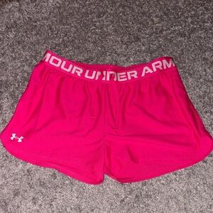 Under Armour Size YXL Bright Pink Athletic Shorts, Will Fit Women’s Small